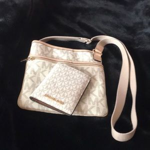Michael Kors crossbody bag with matching wallet.